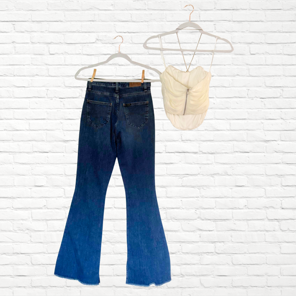 Women Flared Blue Jeans and Cream Corset Outfit