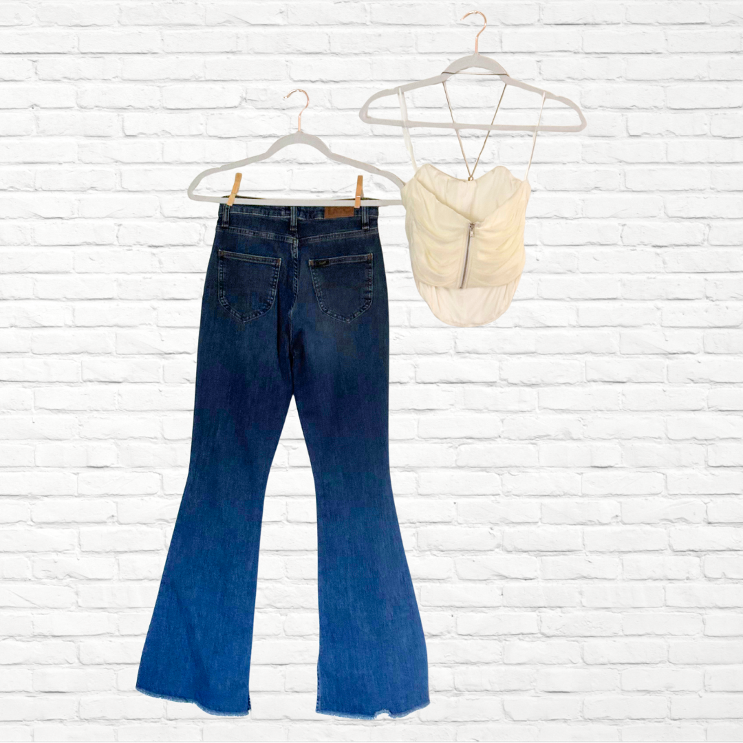 Women Flared Blue Jeans and Cream Corset Outfit