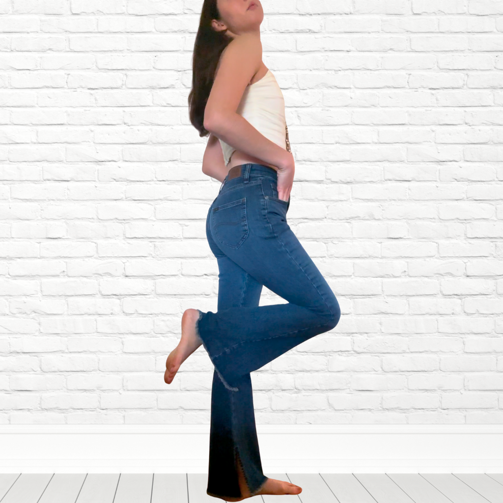 Women Flared Blue Jeans and Cream Corset Outfit